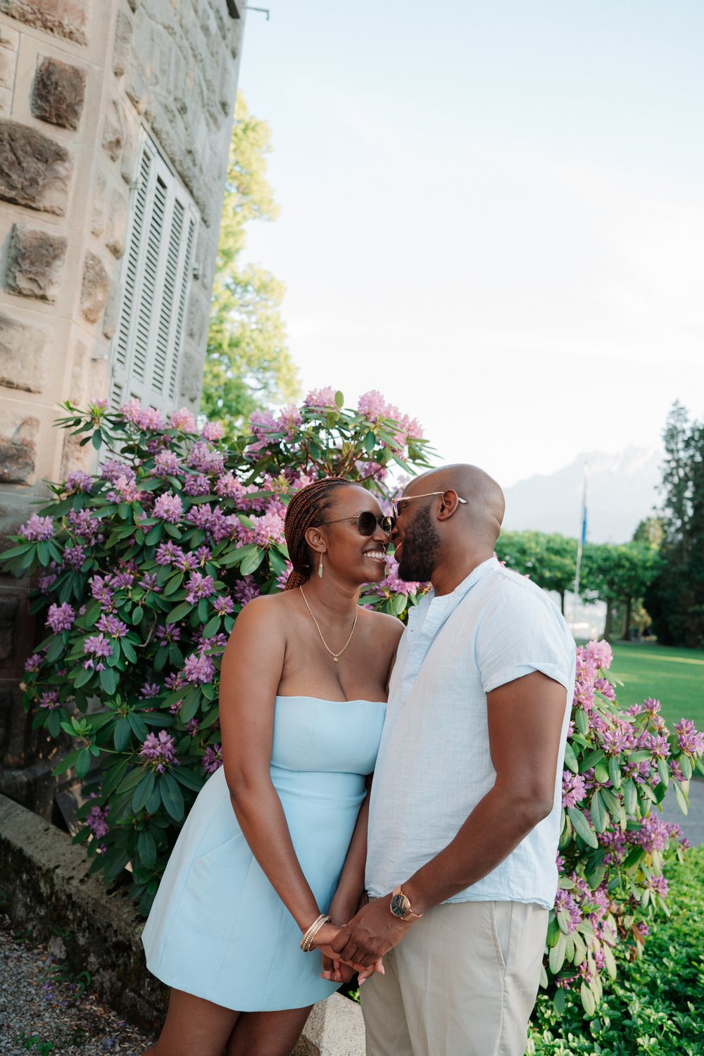 Embracing among the lilac blossoms