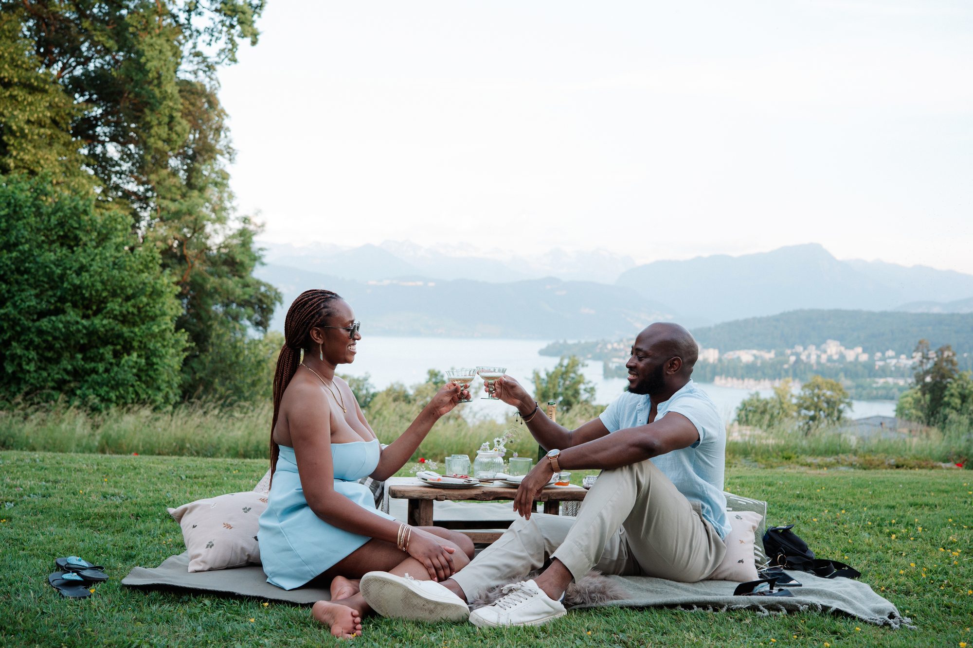 Sharing a toast at the lakeside picnic