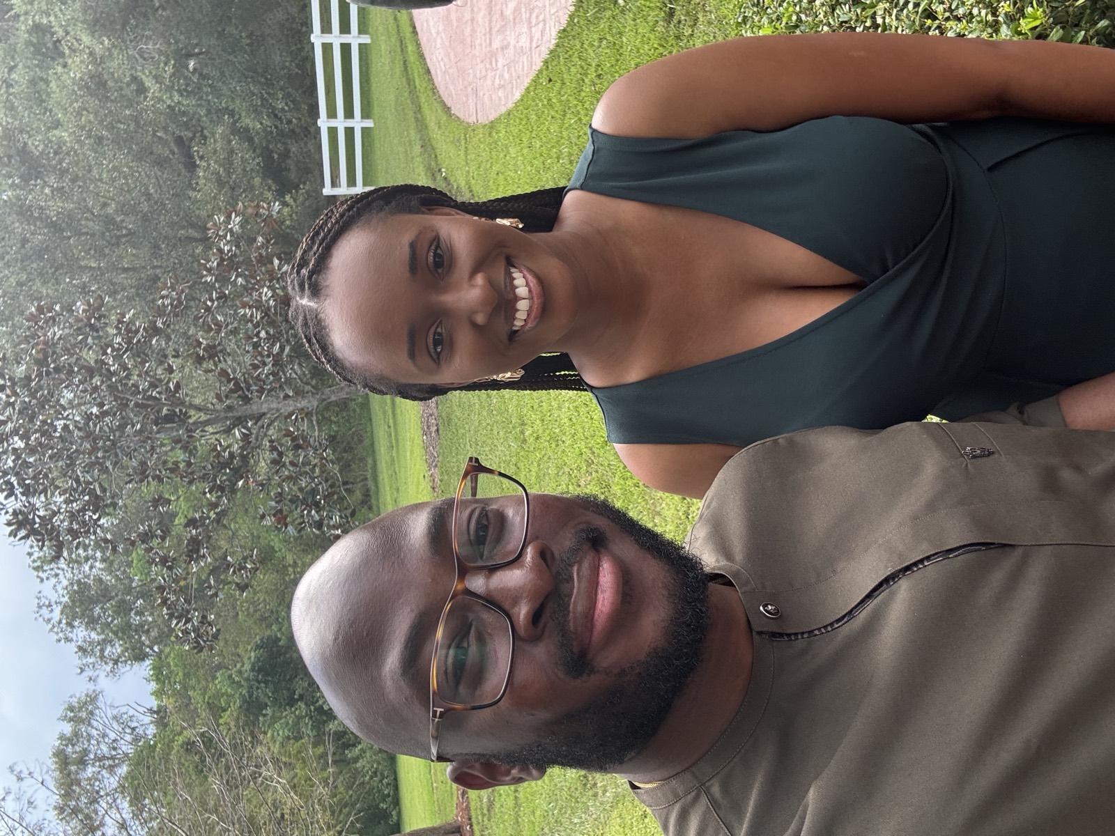 Sally and Adetunji dressed up in a Texas garden, September 2024